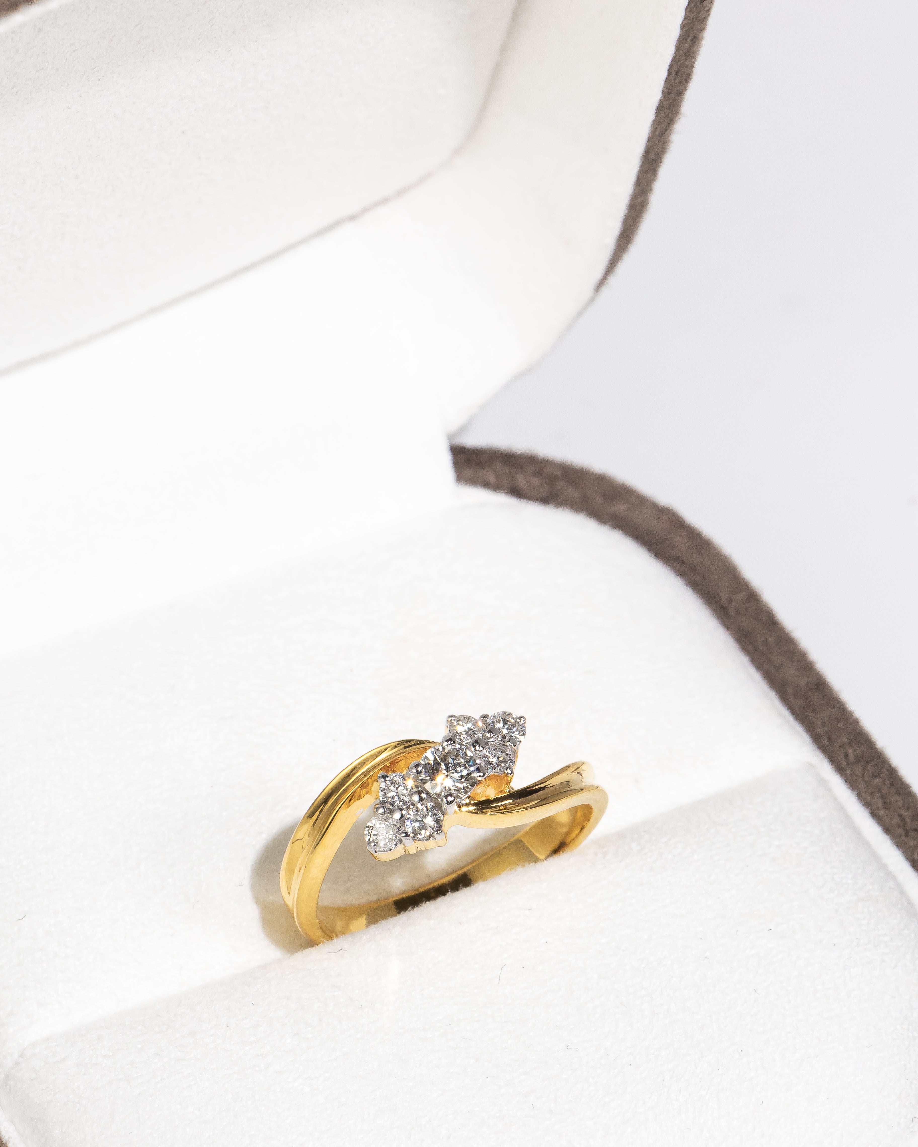 Thin Twisted Gold Band with Diamonds